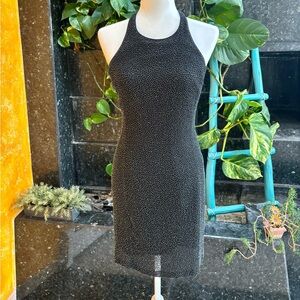 Bieff Basix 100% Silk size 6 beaded racer back dress with a zipper closure.